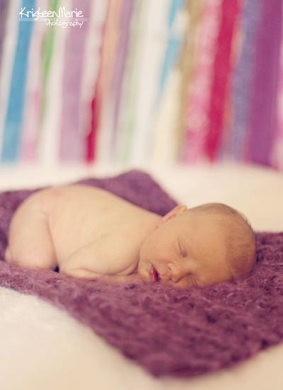 Newborn with Purple Backdrop