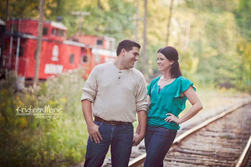 Couple on Railroad Tracks