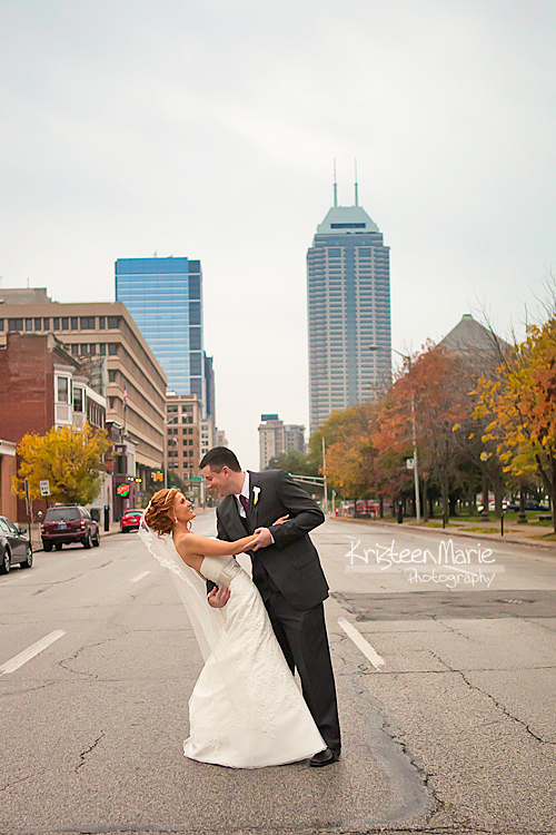Bride and groom in street downtown Indianapolis