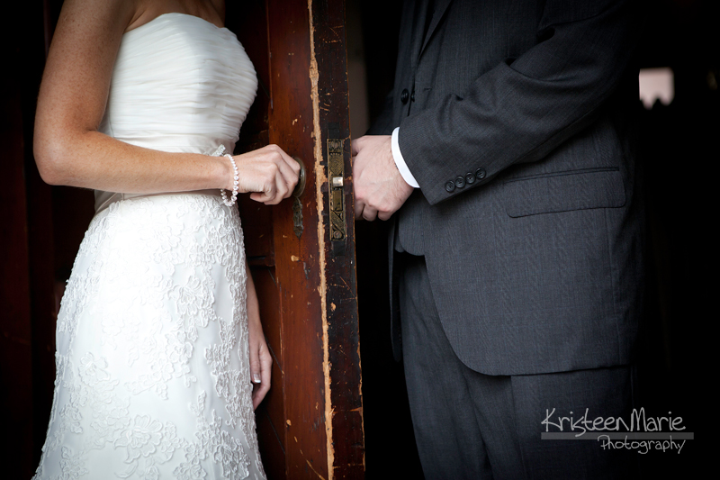 The first look - door between bride and groom