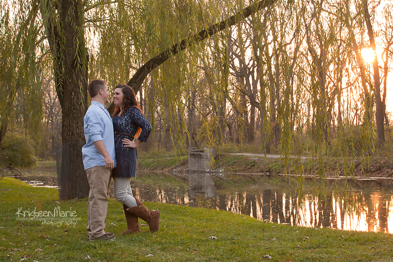 Couple in sunset with weeping willow tree