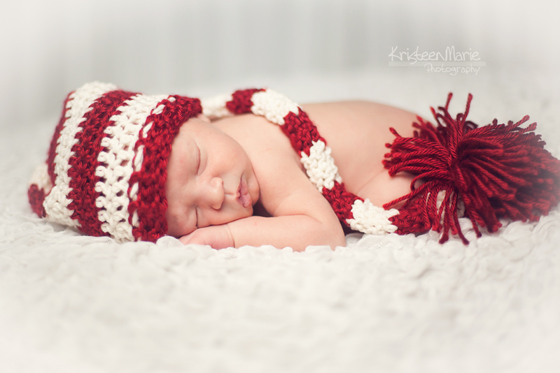 Newborn in red hat