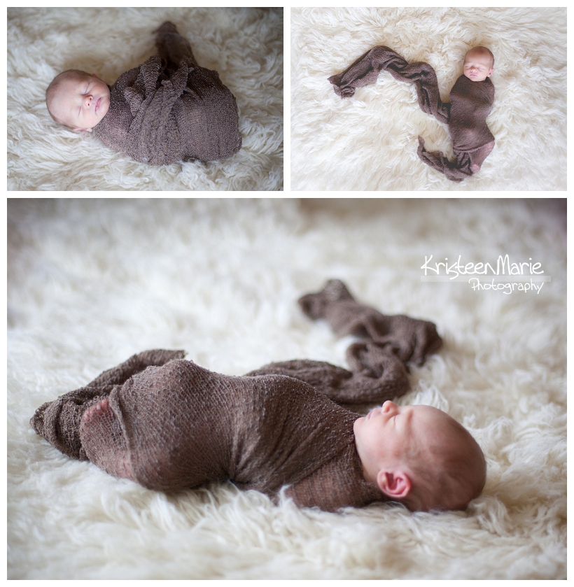 baby boy in brown wrap on shag rug