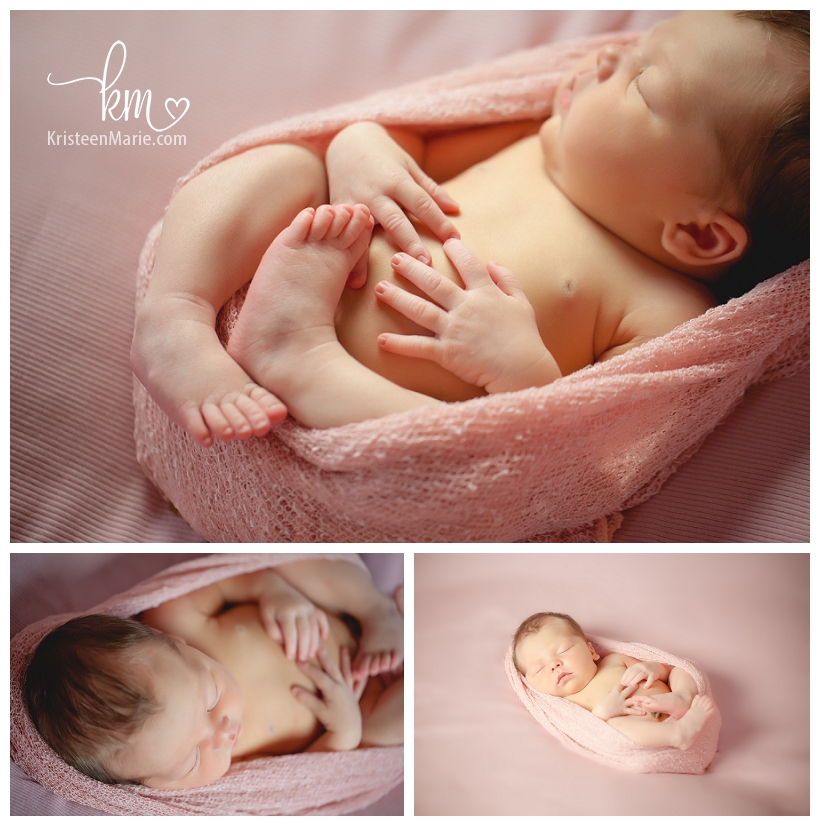 newborn baby girl in pink cocoon