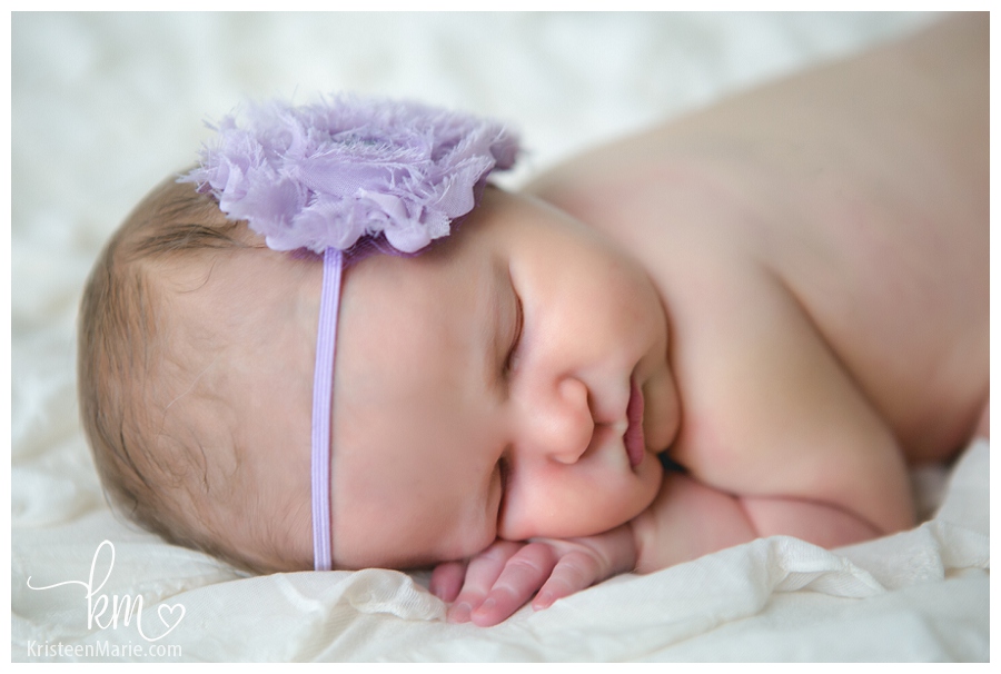 baby with purple headband