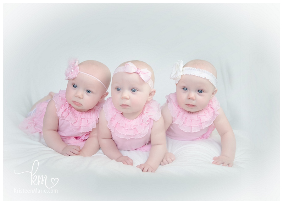 Triplet girls in pink