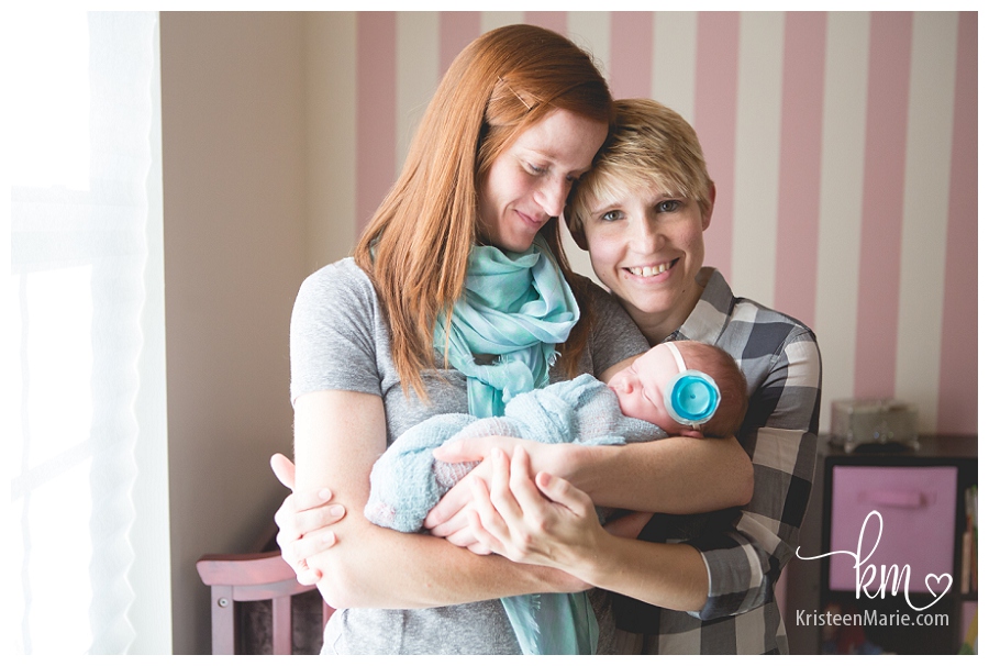 lesbian couple with newborn baby