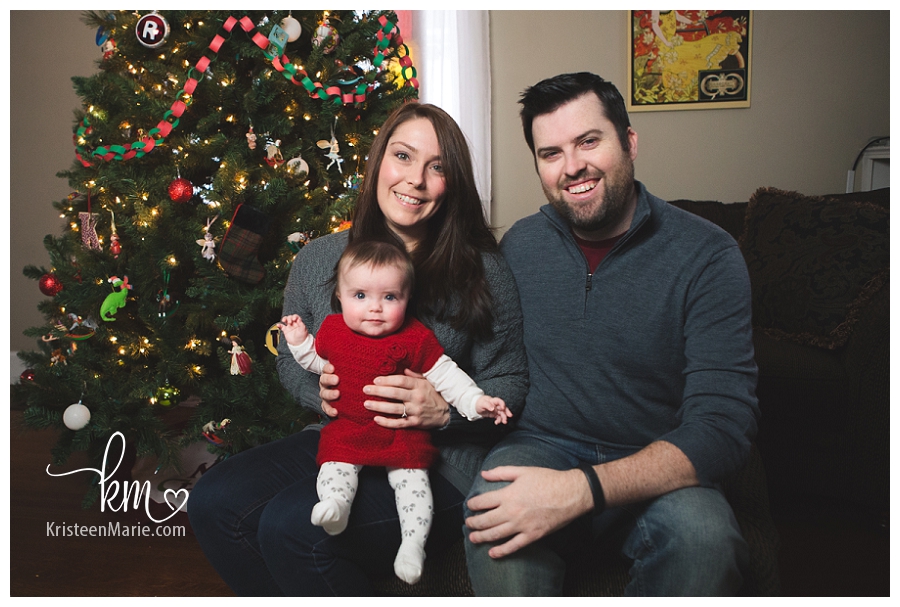 family photography in front of Christmas tree