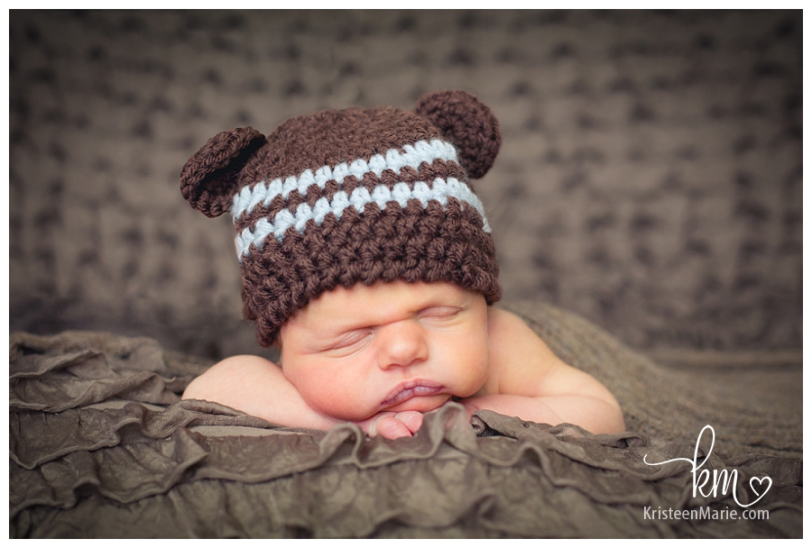 newborn boy with bear hat