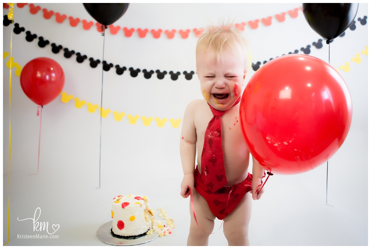 Unhappy Baby Smashing Cake with Balloon 