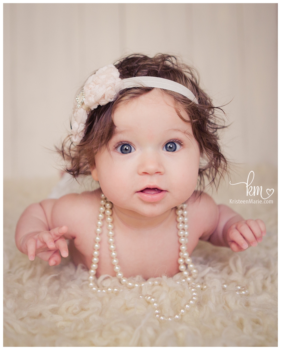 Child in pearls from Fishers Indiana