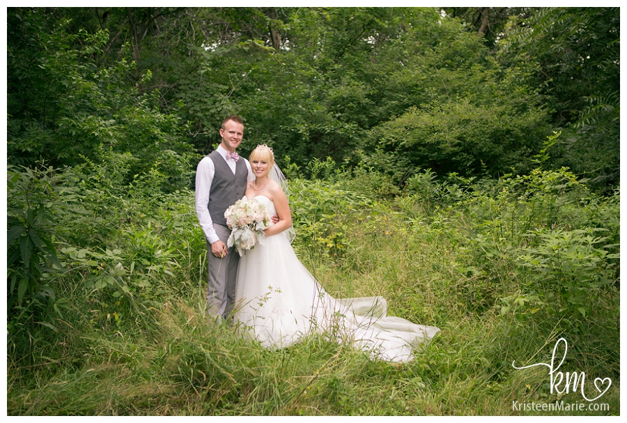 Couple in field at Avon Wedding Barn