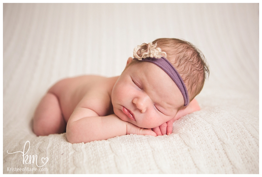 little girl in a purple headband