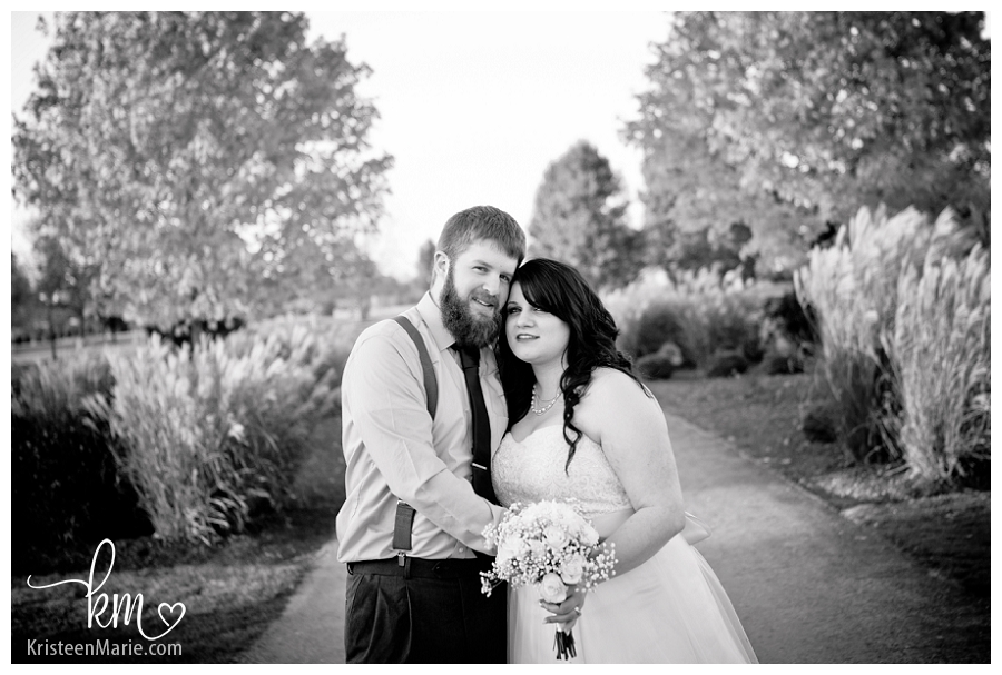 black and white wedding picture with bride and groom