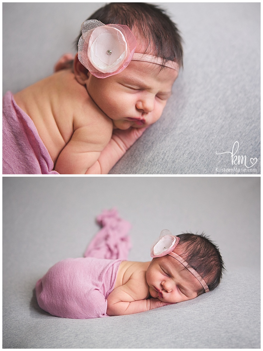 newborn baby girl in pink and grey