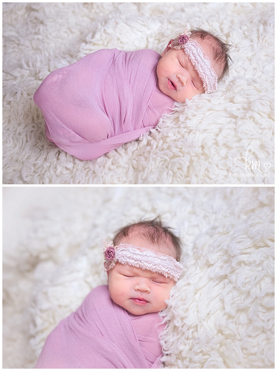 newborn baby wrapped and sleeping