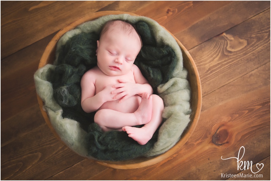 rustic newborn baby picture - green and brown