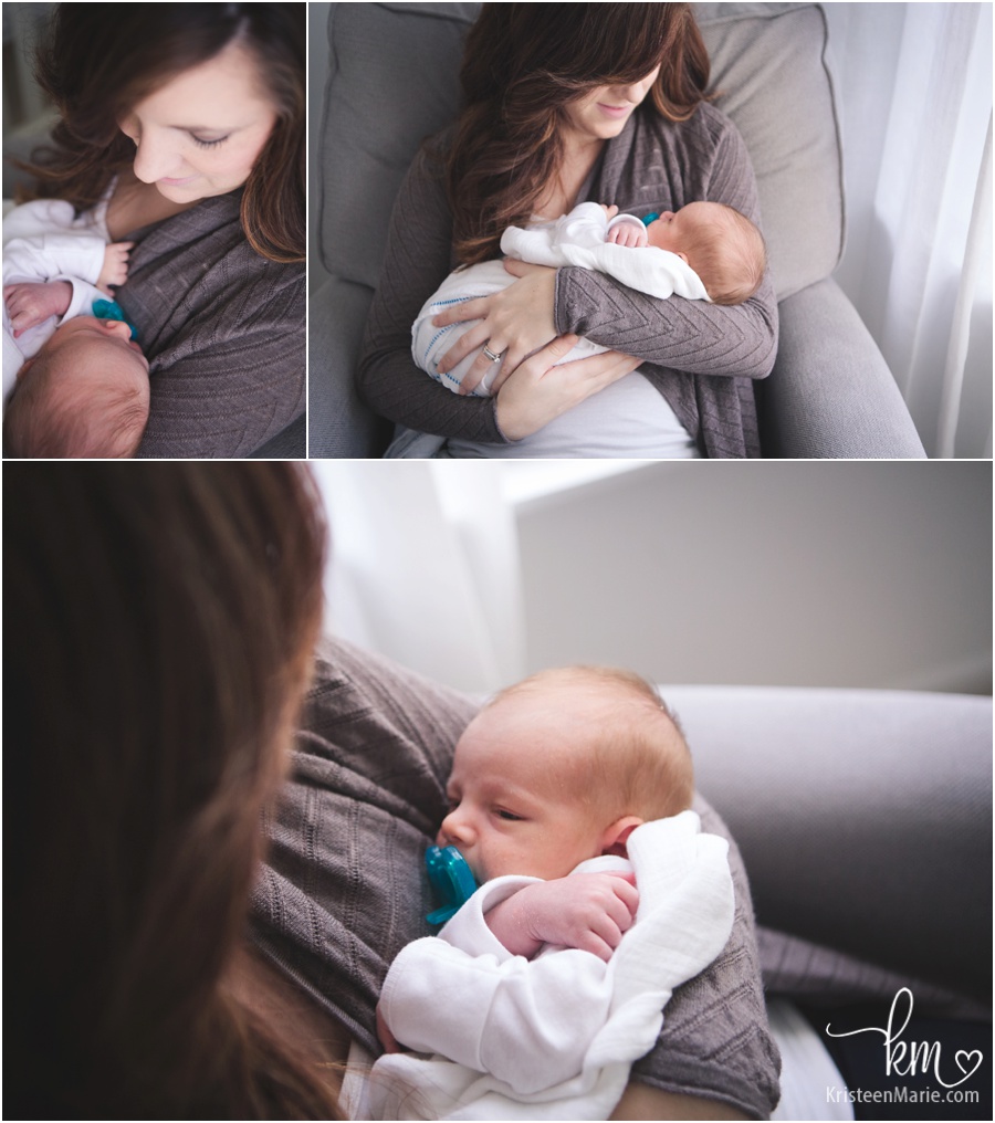 baby in mom's arms in nursery - lifestyle newborn photography