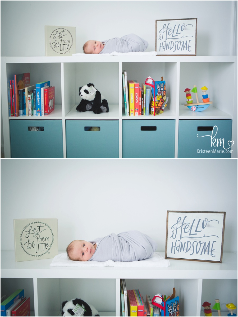 baby in nursery with cute signs