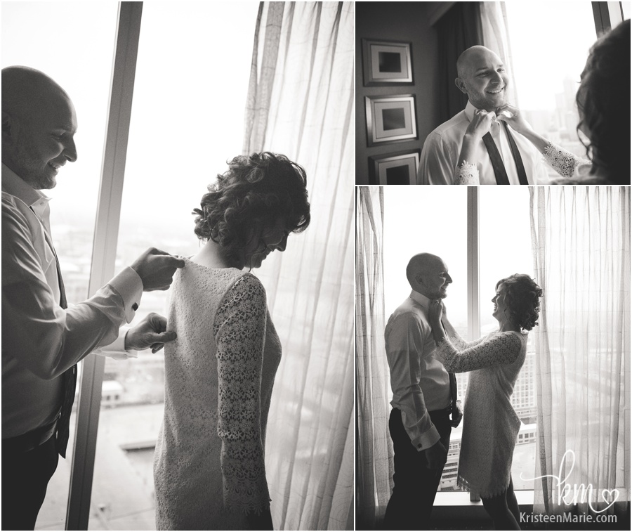bride and groom helping eachother get ready