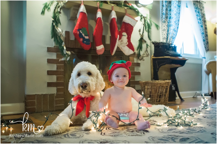 dog, baby, and Christmas lights - adorable Christmas card idea with dog and baby in their home