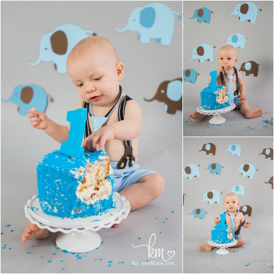 blue birthday cake and birthday boy