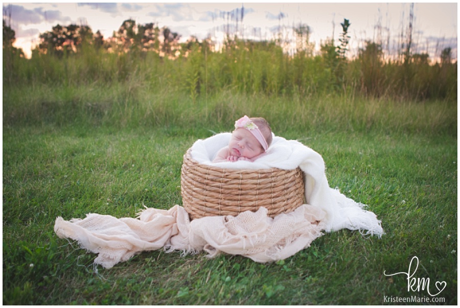 outdoor photography with newborn baby girl