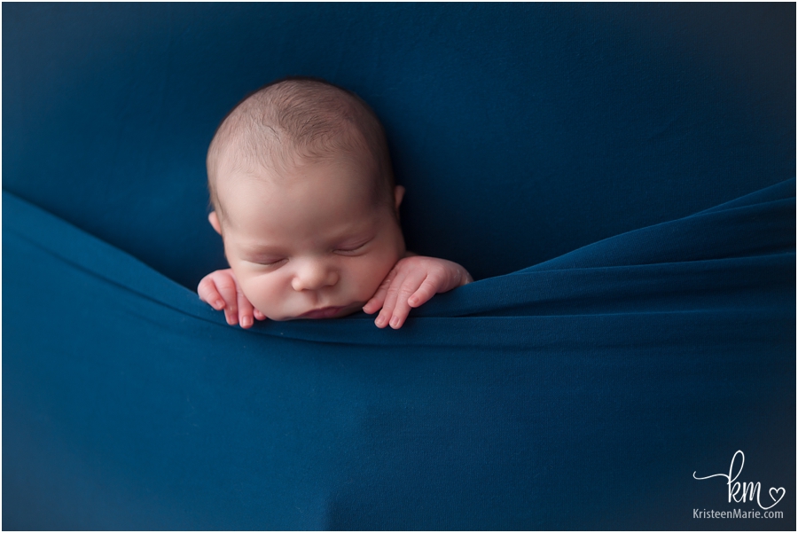 newborn baby boy in blue