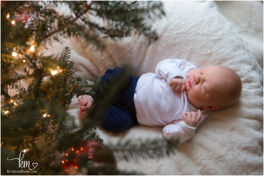 baby under the Christmas tree