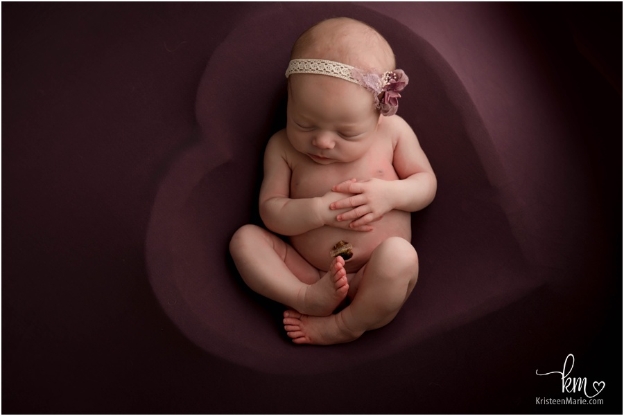 newborn girl in heart - purple