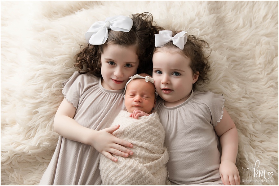 three siblings - newborn baby sister