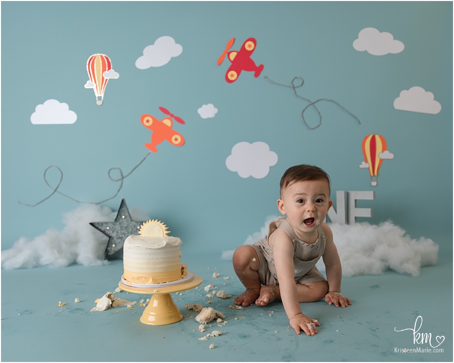 Time flies cake smash session for baby's 1st birthday