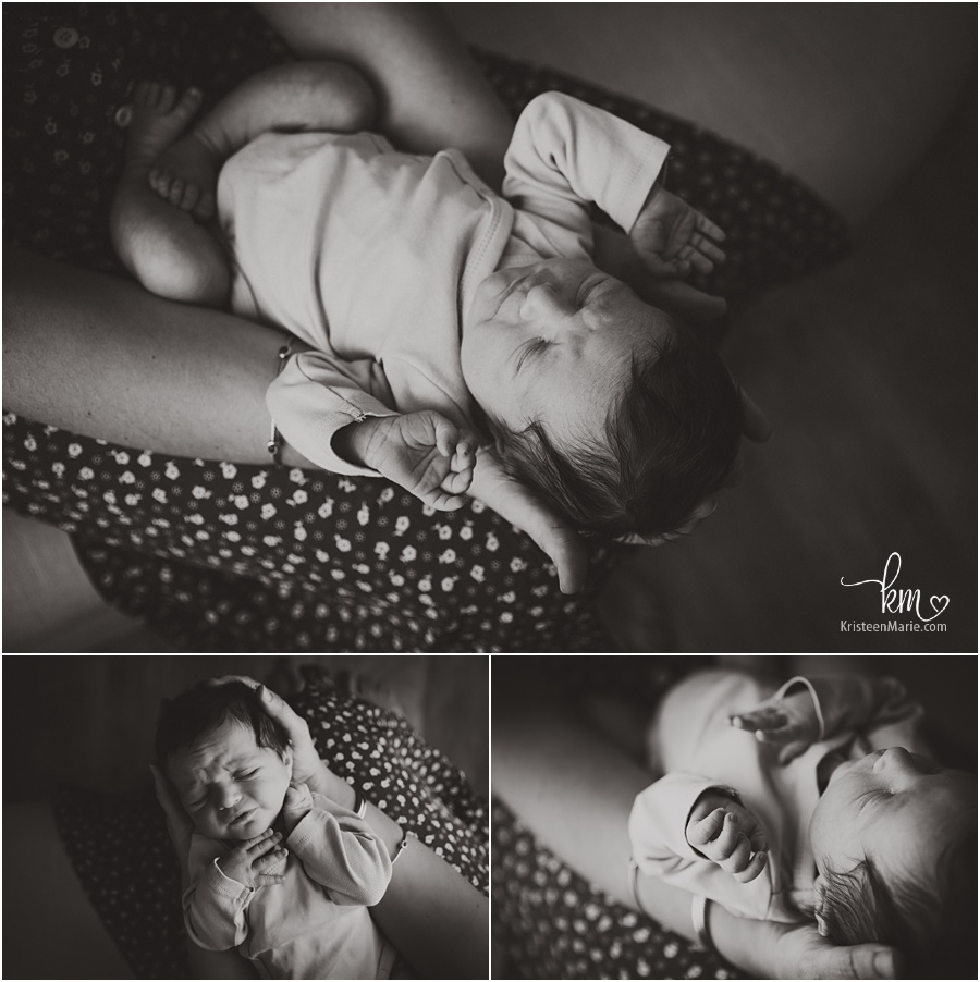 newbor girl in mom's hands - back and white newborn photography