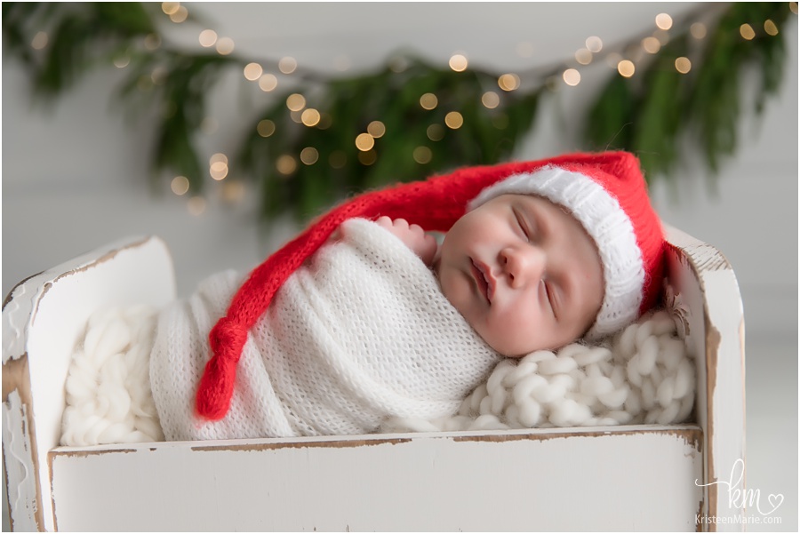 Christmas newborn picture - santa hat and twinkle lights