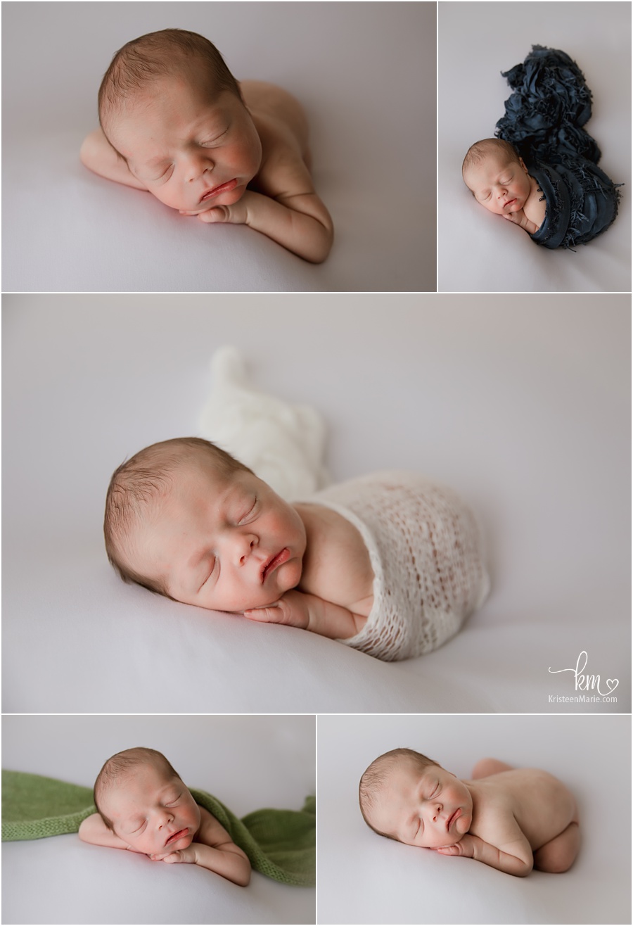 newborn sleeping on white backdrop and pops of color