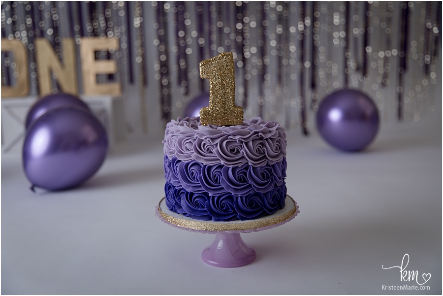purple and gold 1st birthday smash cake
