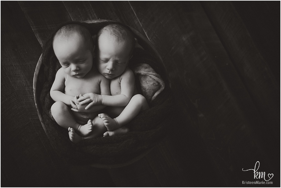 newborn boys in black and white