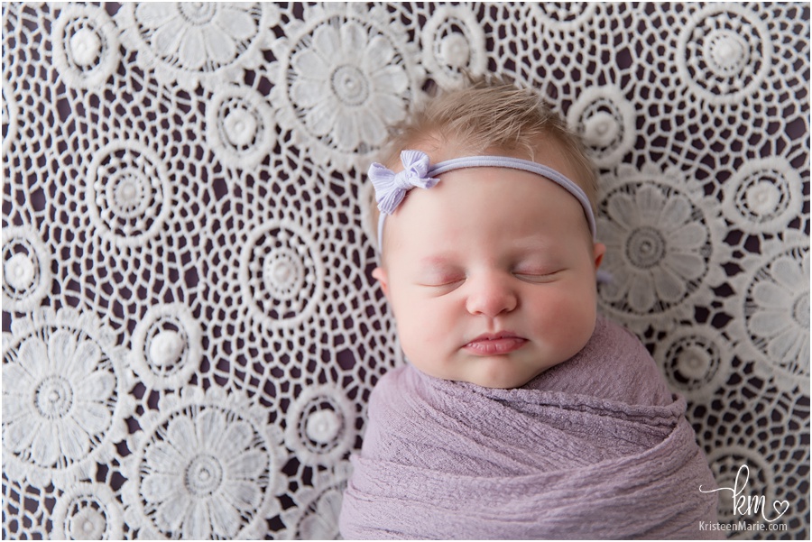 sleeping newborn girl - boho set-up lace and purple
