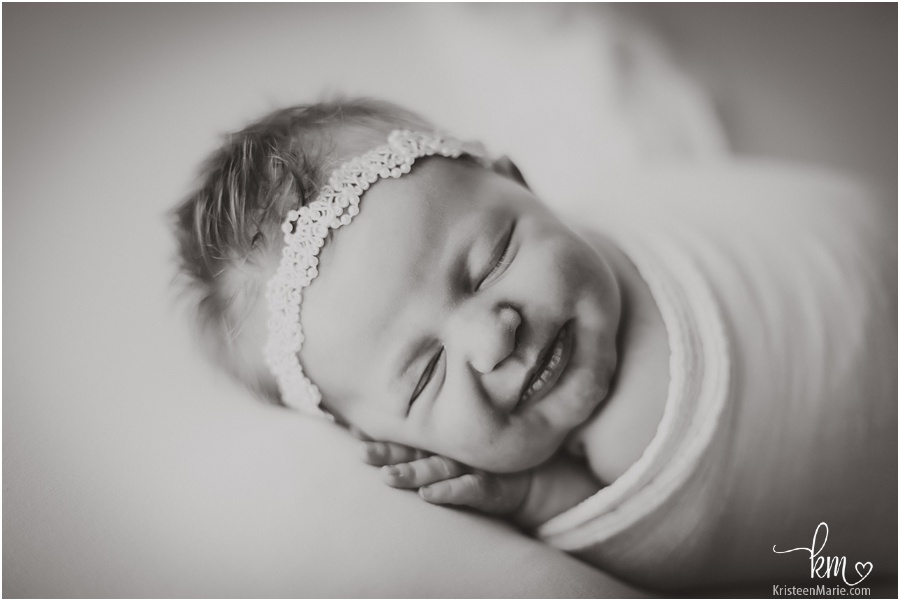 black and white newborn photography - newborn smilies