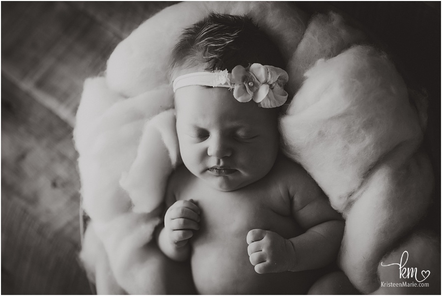 black and white newborn image - baby girl in bowl