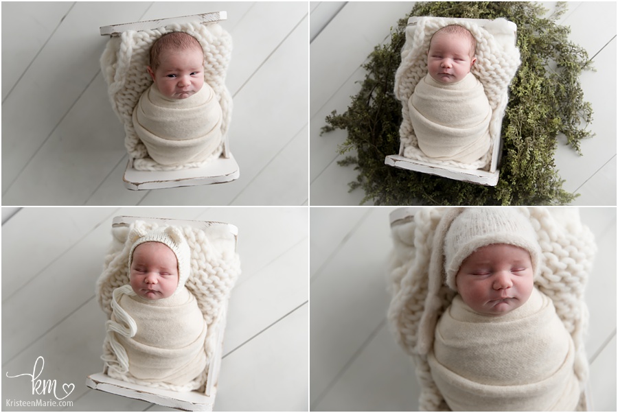newborn photos in white crib