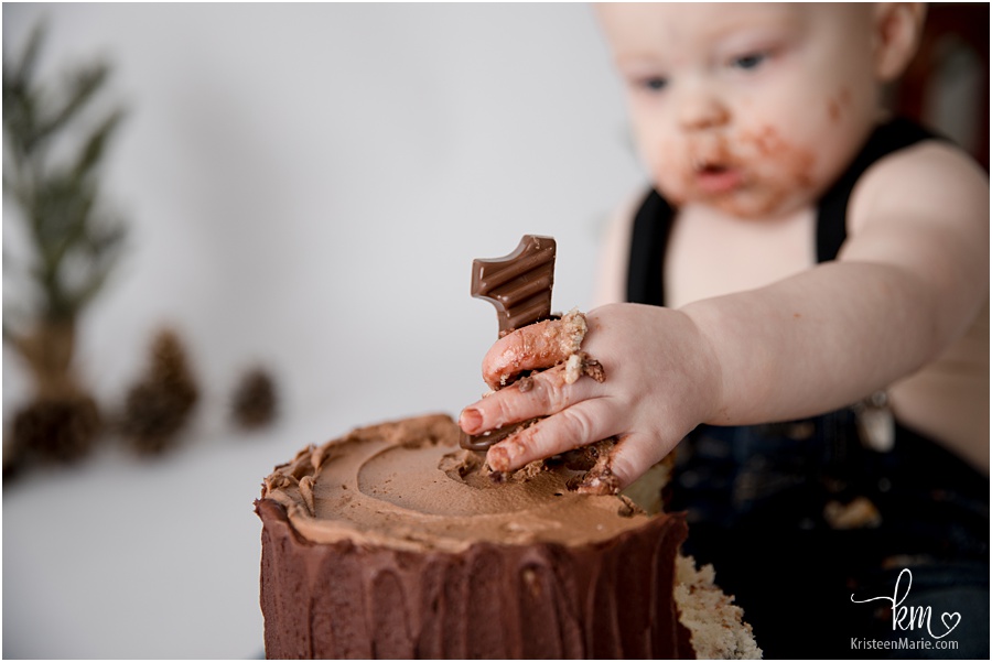 tiny hands reaching for cake
