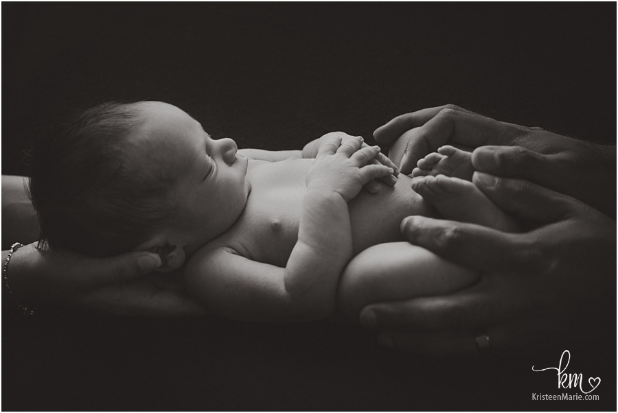 newborn boy in black and white