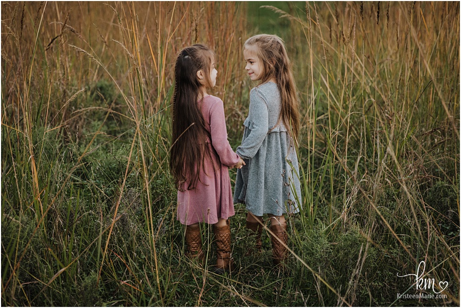 Twin sisters in field