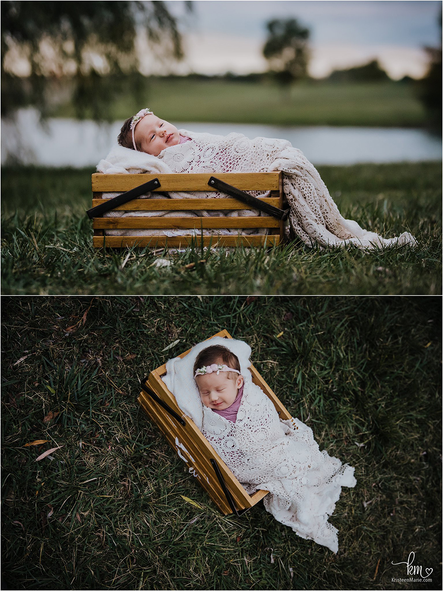 Outdoor newborn photography at sunset - baby in a basket
