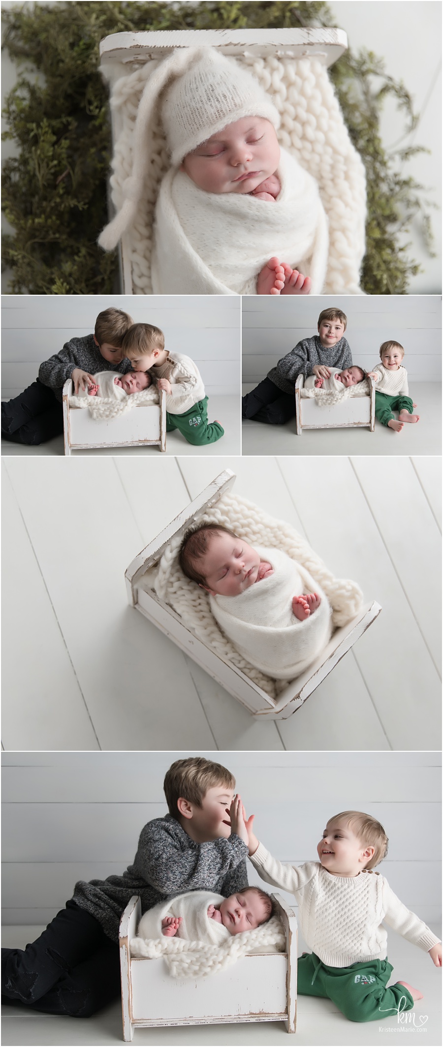 newborn photography on white wood with brothers