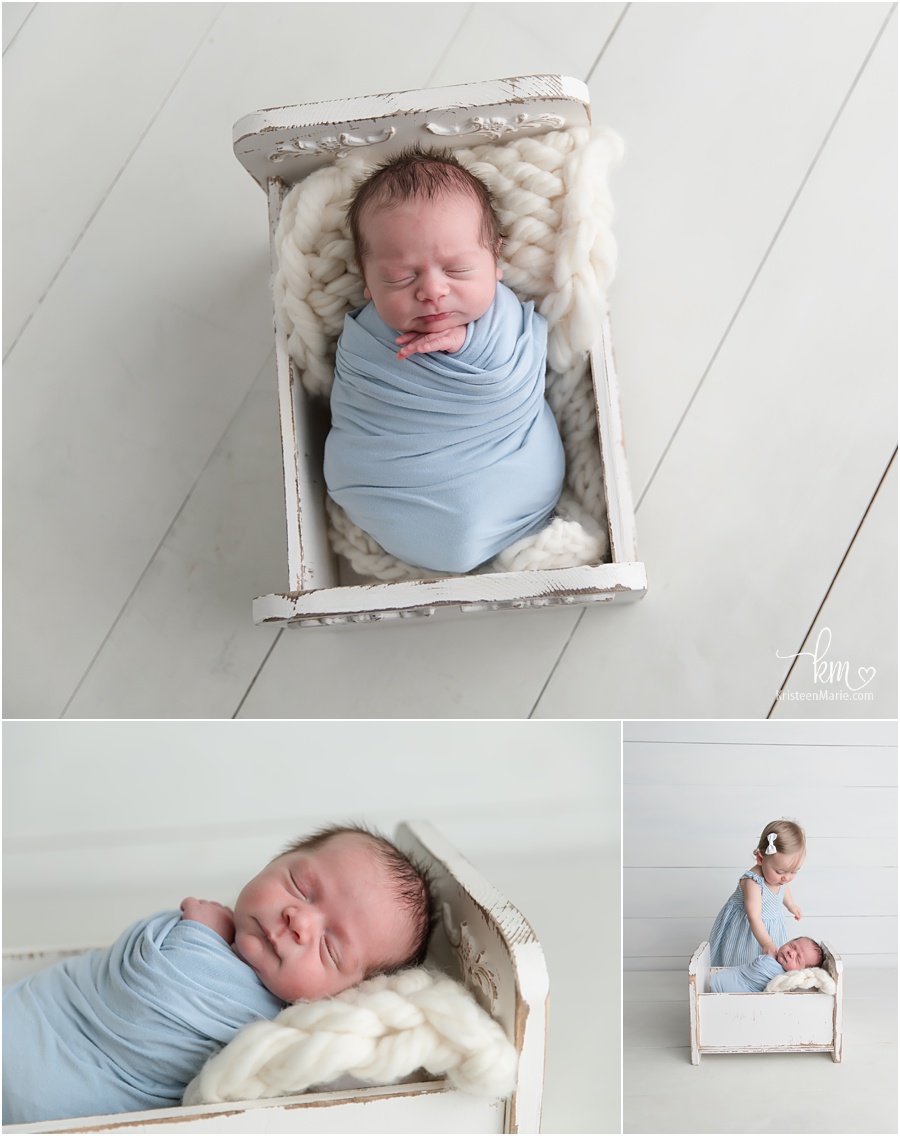 baby in a bed - sleeping newborn photography