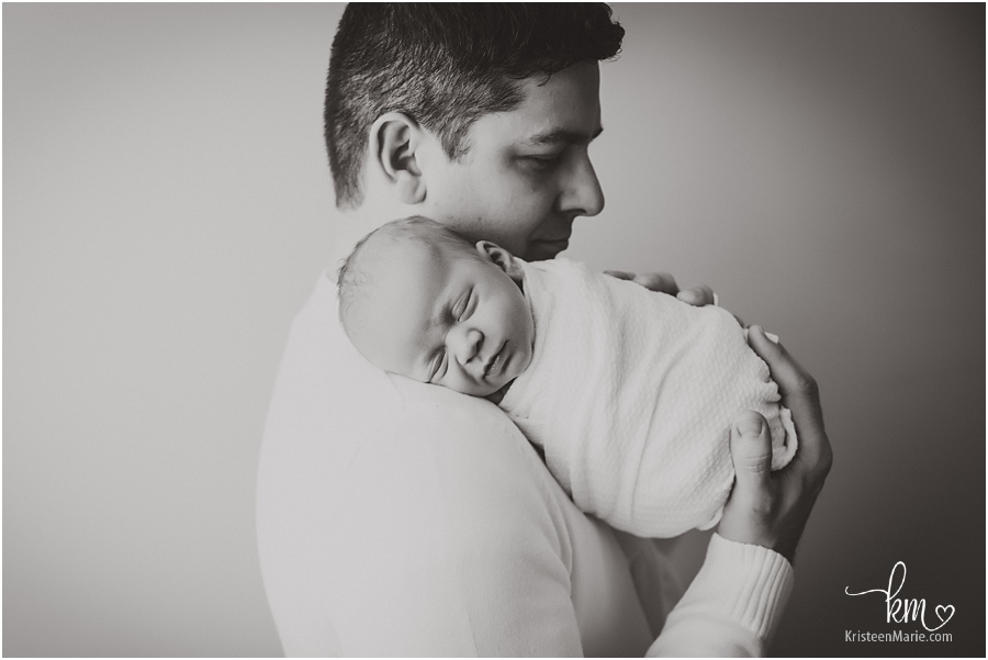 dad and baby - black and white image