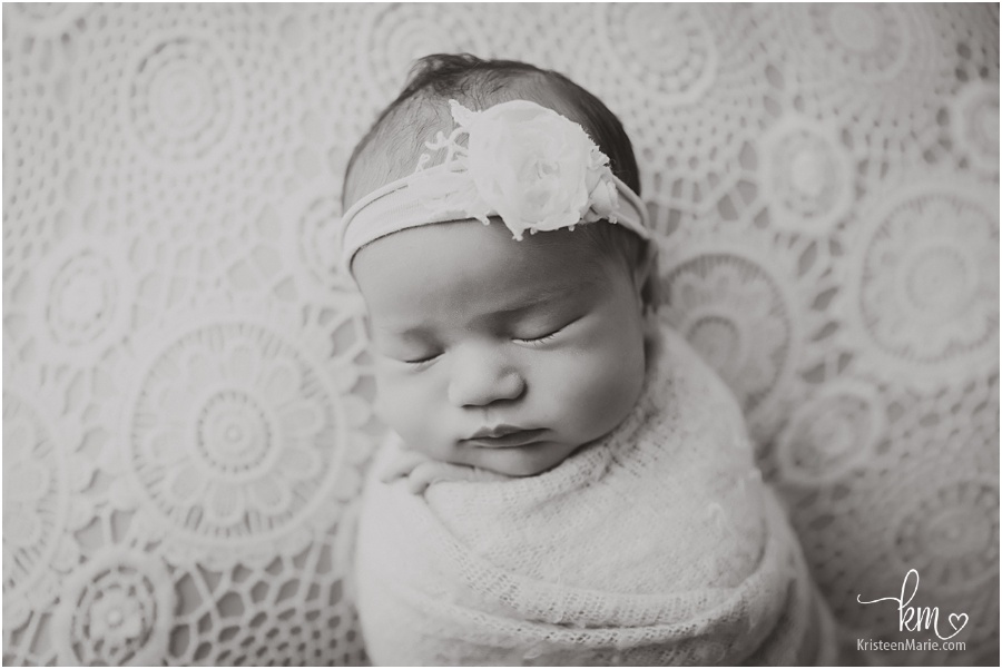 swaddled newborn girl - black and white image
