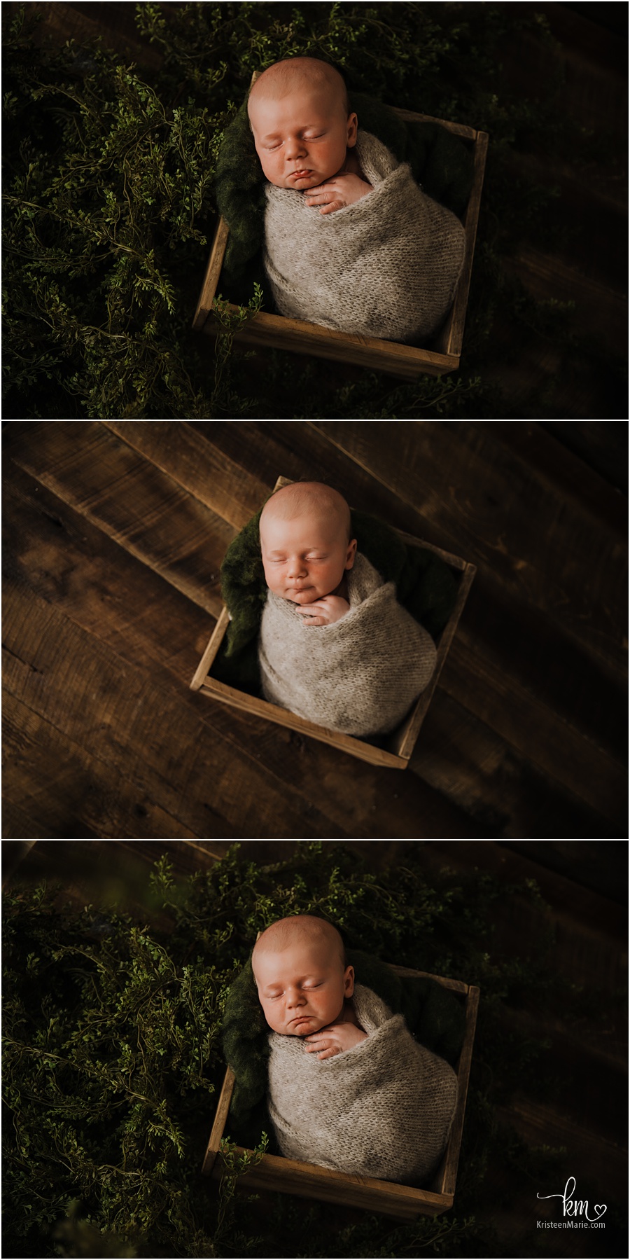 Newborn boy in rustic box with greenery